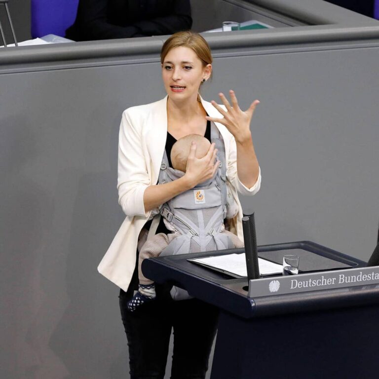 German MP Hanna Steinmüller delivers a Bundestag speech while carrying her baby
