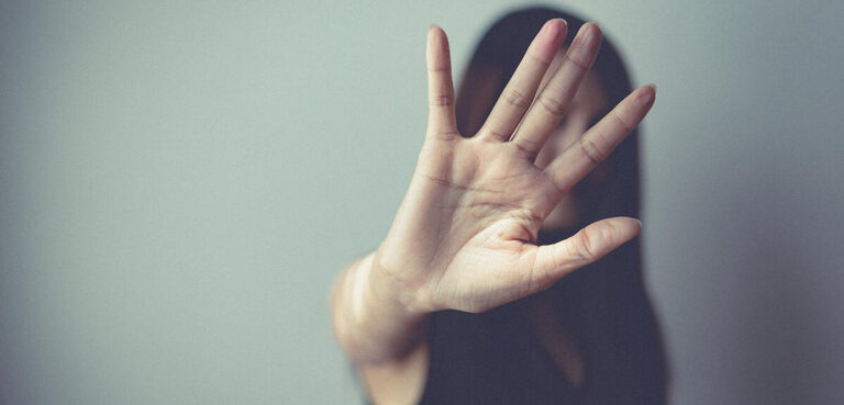 sexual abuse for women gender in society, a girl hand is stoppin